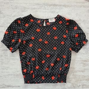 Black blouse with red flowers ñ